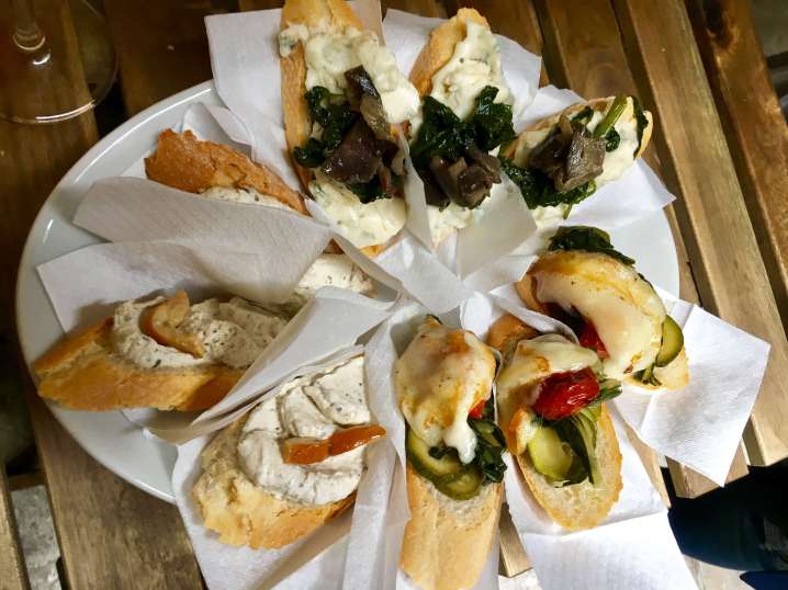 Traditional food in Venice:What to do in Venice: Go into an Osteria and try some Cicchetti(like Tapas)with wine or Prosecco