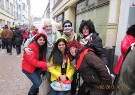 Friends in fancy dress at Cologne carnival, photographed in the street
