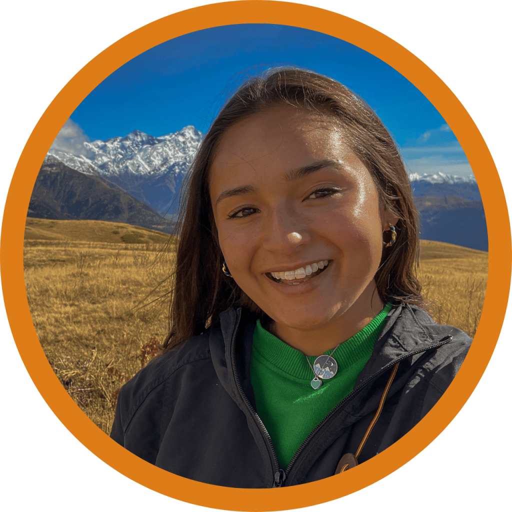 Portrait of guest author Cassandra Tesi against a mountain landscape