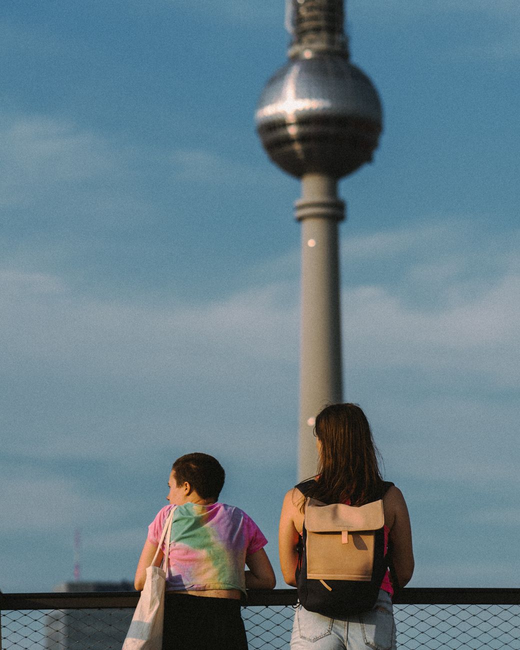 people looking at high tower